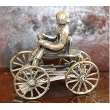 Hollands Zilver (20ᵉ eeuw) Miniatuur Meisje op vierwieler