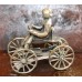 Hollands Zilver (20ᵉ eeuw) Miniatuur Meisje op vierwieler