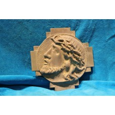 Bronzen reliëf (19ᵉ eeuw) 
Hoofd van O.L.H. omringd door kruis