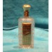 Kristal met goud (19ᵉ eeuw)
Parfumflesje met 18 karaats goud met inscriptie N. van Gelder