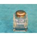Kristal met zilver  (20ᵉ eeuw)Zout strooier met zilveren dop