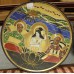 Japans Aardewerk (20ᵉ eeuw) Sierbord
Witte fee met twee mannen