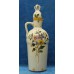 Gouds plateel (1936)
Geribbelde kruik met bloemmotief met stop