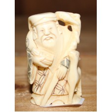 Ivoor  (20ᵉ eeuw) Netsuke
Tovenaar met staf