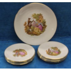 Bavaria Porcelain (20ᵉ century)
7-piece pastry dishes with floral pattern and motif romances