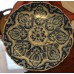 Makkum (20ᵉ eeuw) Sierbord blauw Met decor van bloemen iets geribbeld