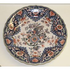 Makkum (1941-1946) Aardewerk  Sierbord Floraalmotief met vogel en versierde randen
